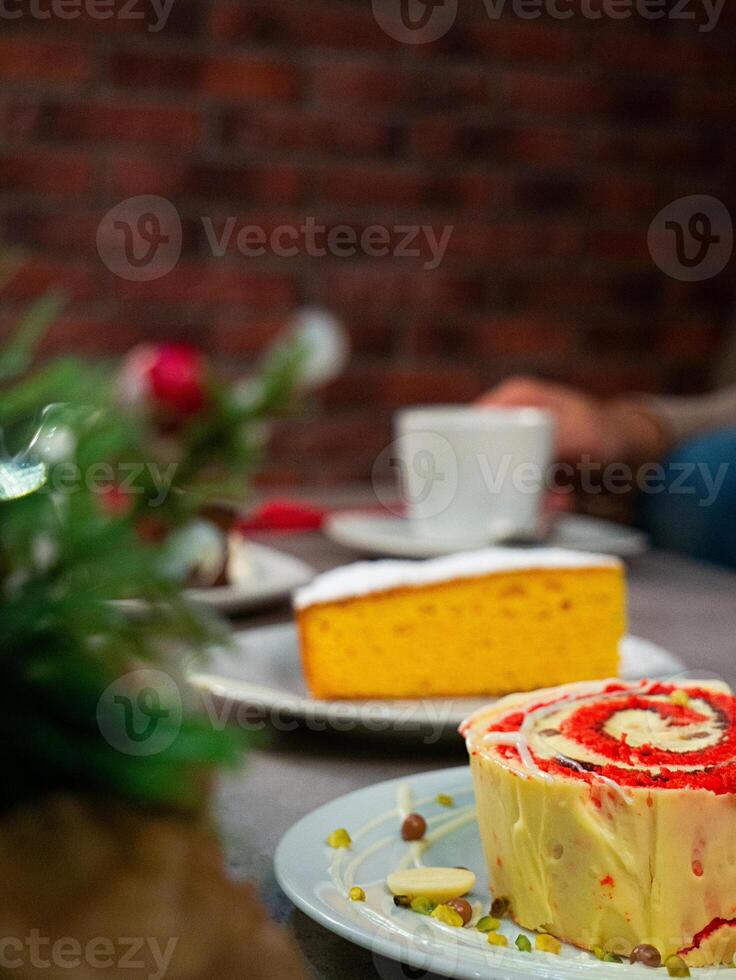 Assorted Cakes with Coffee on a Table photo
