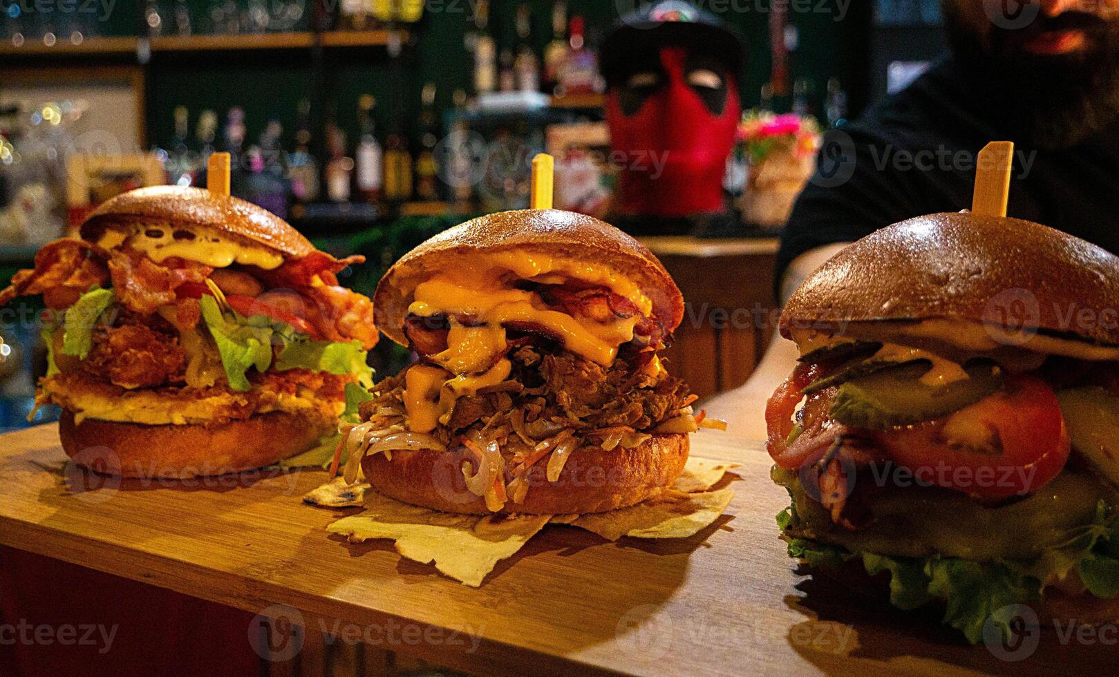 Trio of Gourmet Burgers with Bacon and Pulled Pork photo