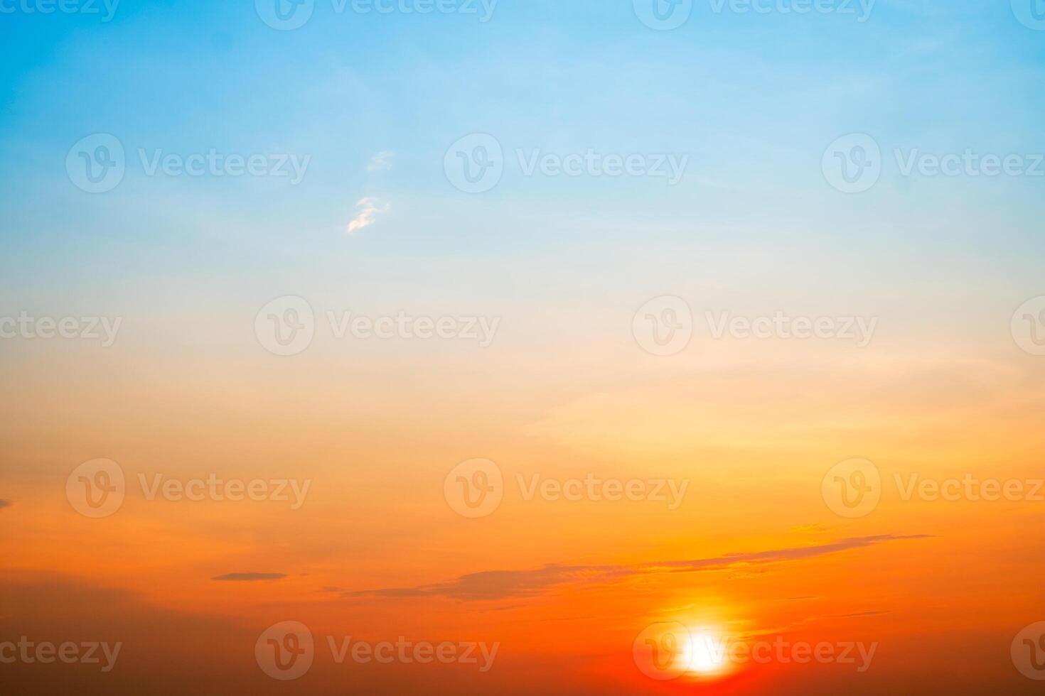 Beautiful , luxury soft gradient orange gold clouds and sunlight on the blue sky perfect for the background, take in evening,Twilight, Large size, high definition landscap. photo