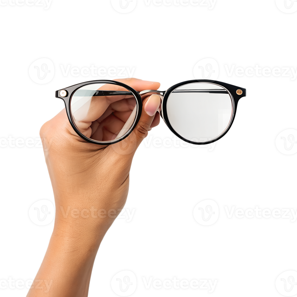 A close-up shot reveals a human hand delicately holding a pair of eyeglasses, showcasing the elegant design png