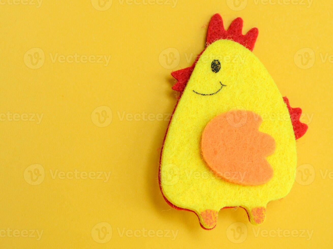 Easter one chicken handmade on yellow background, DIY concept, copy space, flat lay, easter concept photo
