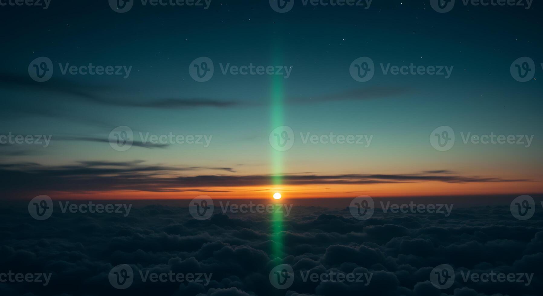 Stunning Sunrise Sky Above Clouds with a Dramatic Green Light Beam photo