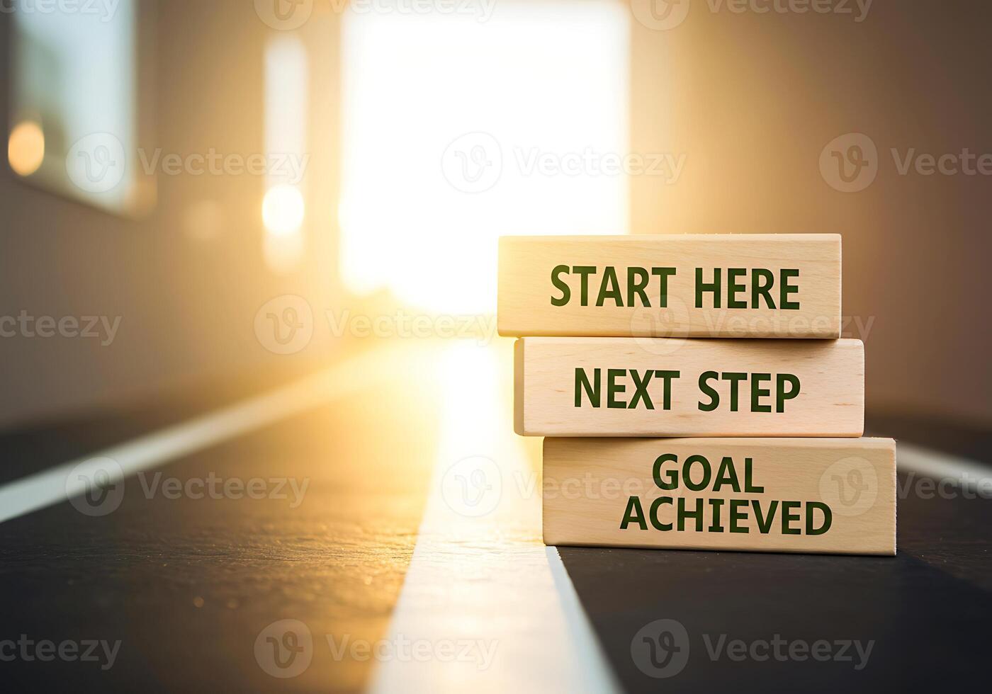 Start here, next step, goal achieved concept with wooden blocks on the road photo