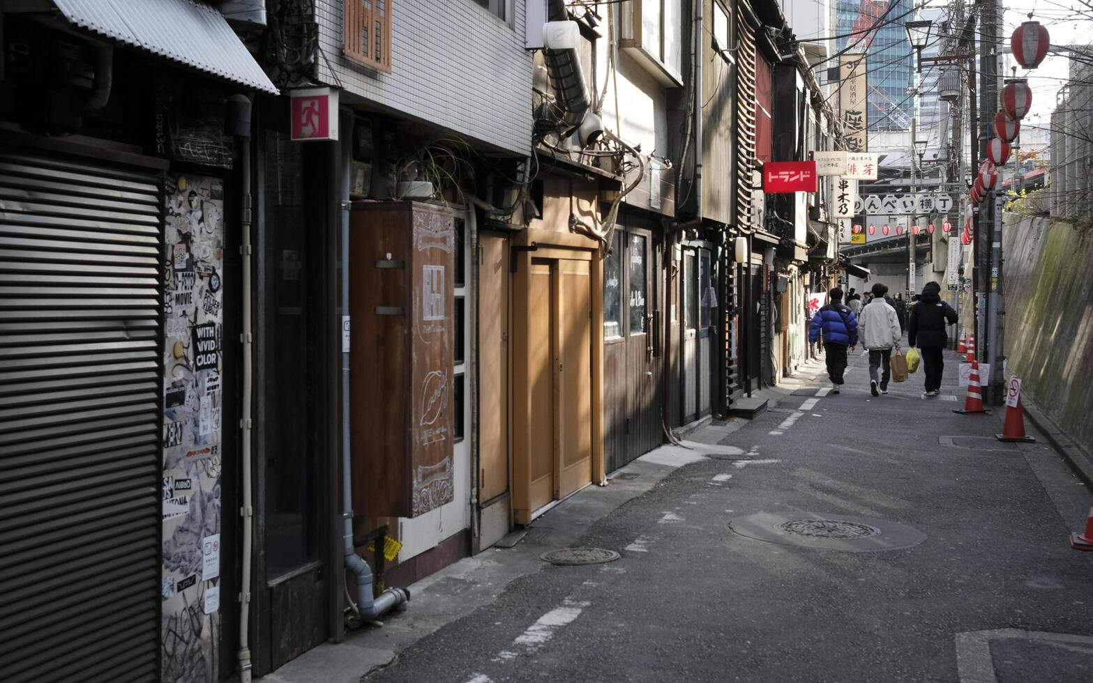 Tokyo, Japan - 20 January 2025 - A quiet street with closed shops and restaurants in Tokyo photo