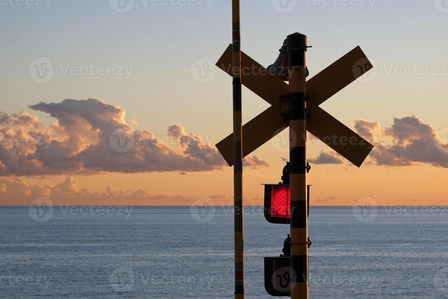 Famous railway crossing in Kamakura, Japan, at sunset photo