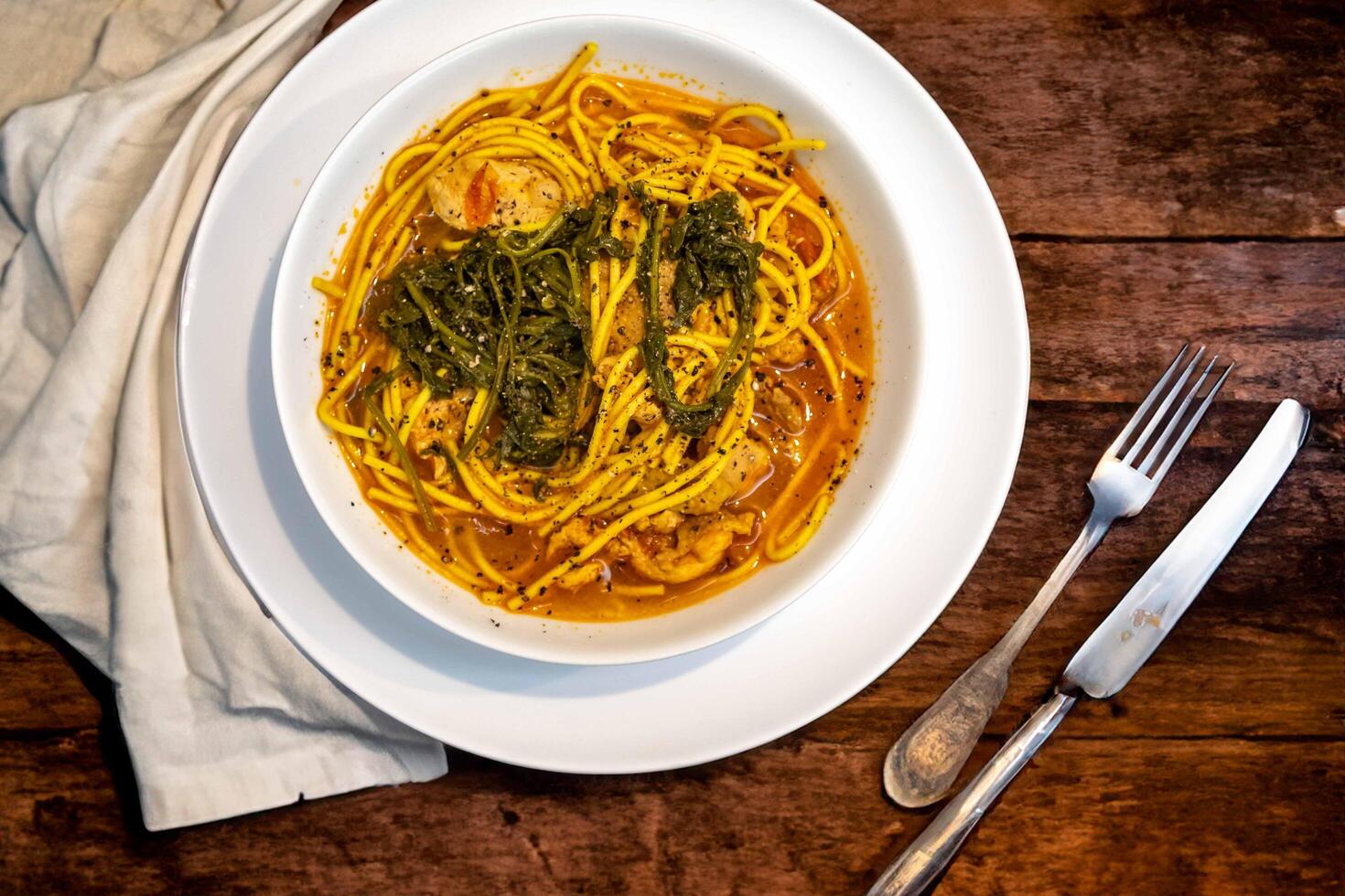The most traditional Ukrainian soup, made with free-range chicken broth, homemade noodles and fresh parsley and chives, known as russil or rossil b photo