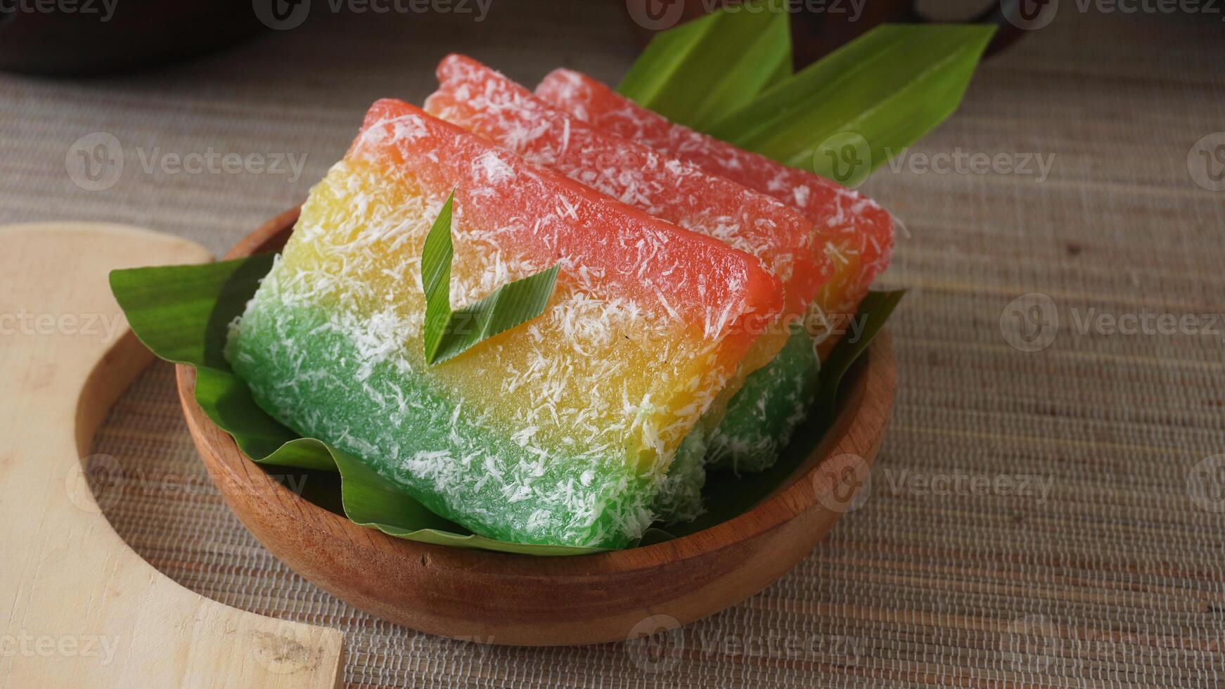 Ongol-ongol, tasty traditional Indonesian snack with chewy texture on wooden plate photo