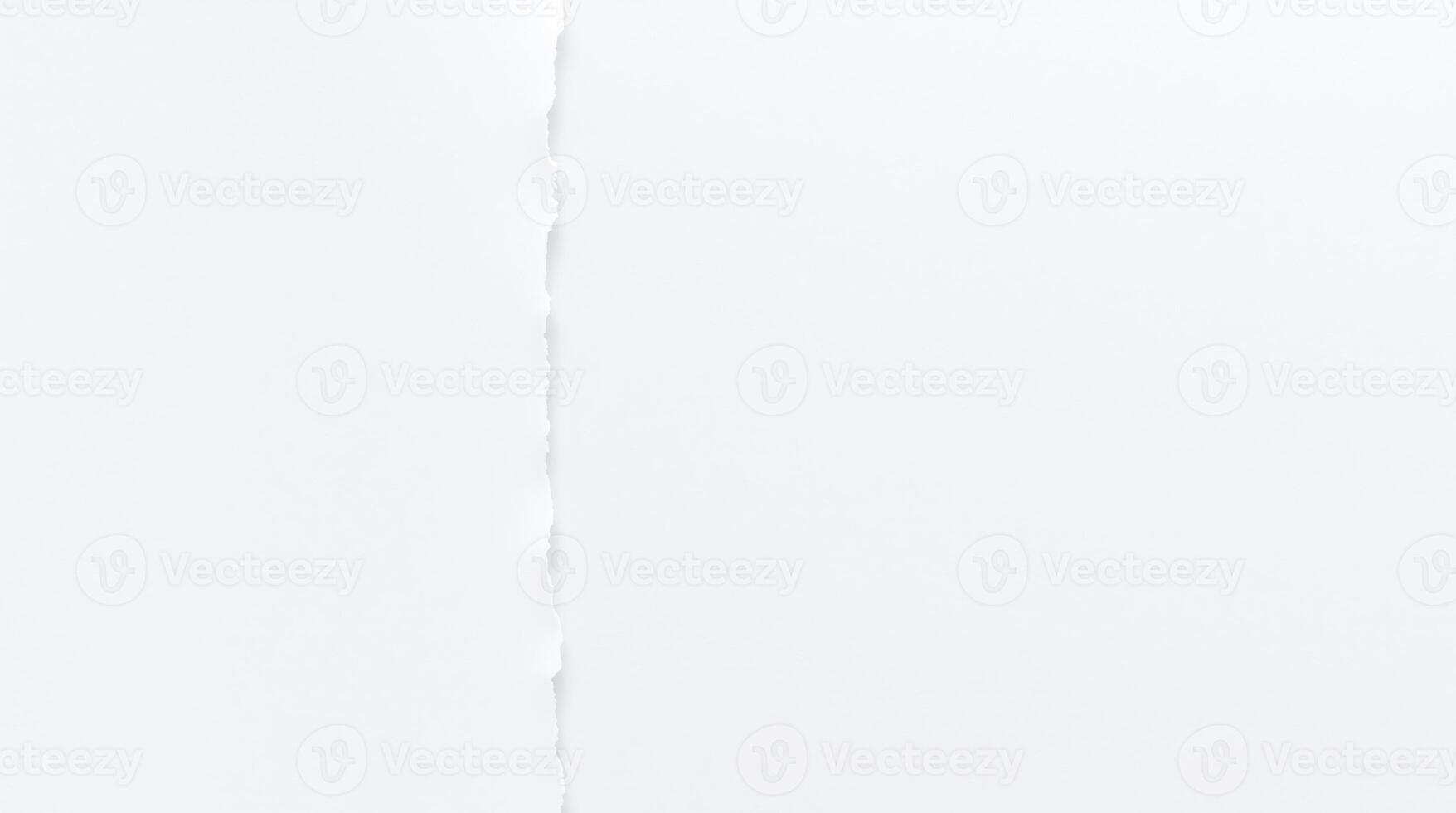 White torn white paper sheet on white background. photo