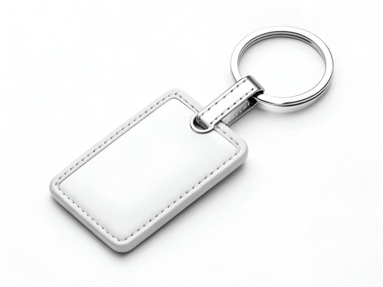 White Leather Keychain with Metal Ring on White Background photo
