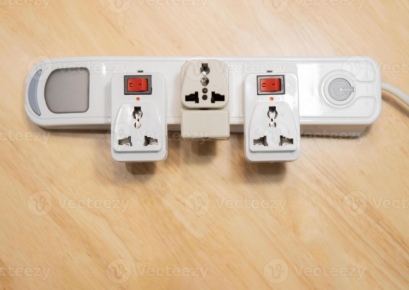 Empty many chargers port on maltiple electrical outlet over wooden background. photo