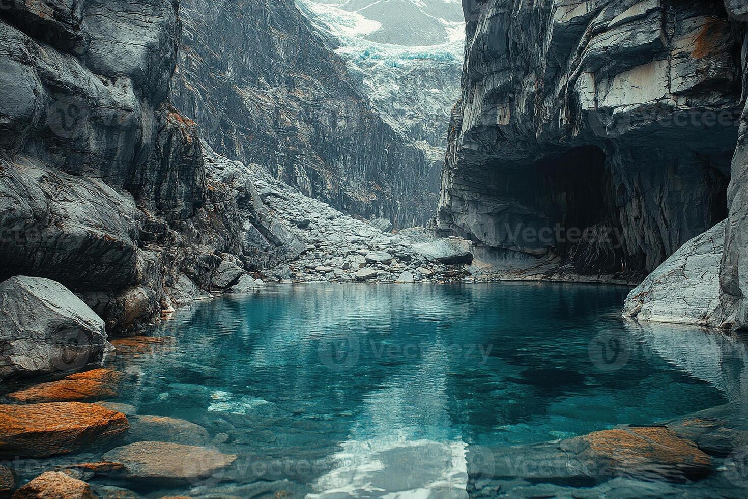 A majestic mountain lake surrounded by rocky cliffs photo
