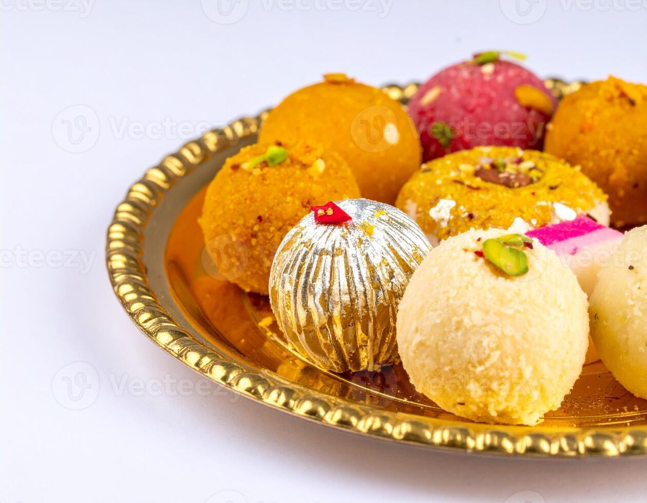Assorted Indian Sweets of Ladoo and Barfi from a Top-Angle Perspective photo