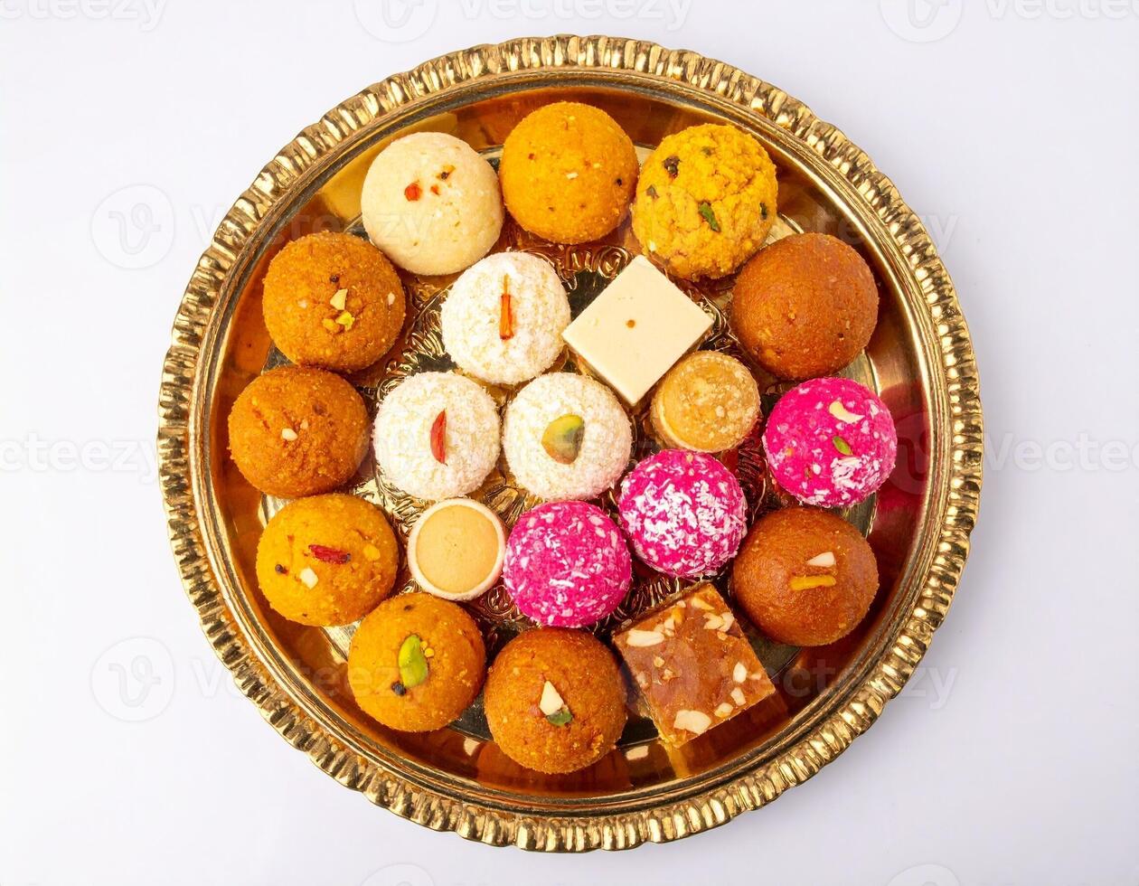 Assorted Indian Sweets Like Ladoo and Barfi in a Beautiful Top-Angle Shot photo