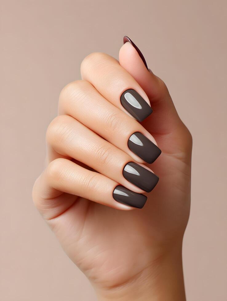 Elegant square shaped manicured nails with matte black polish photo