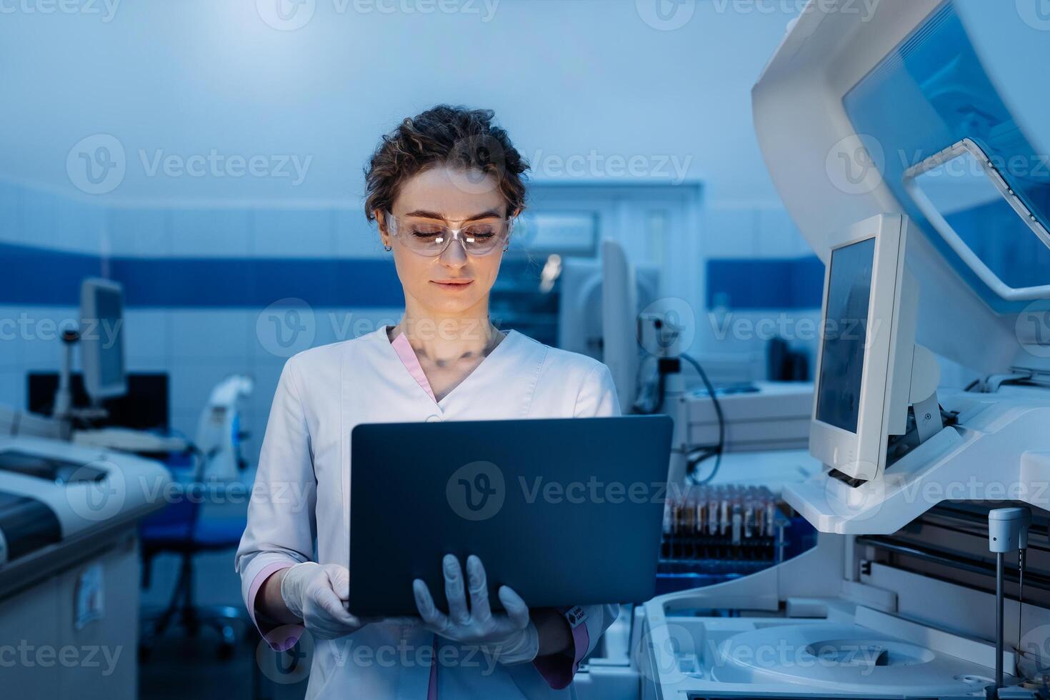 Woman portrait, scientist in lab, chemical engineer and forensics Using Computer. Development Center. Specialist Developing Innovative Medicine For Treating Mental Disorders Or Pain Relief photo