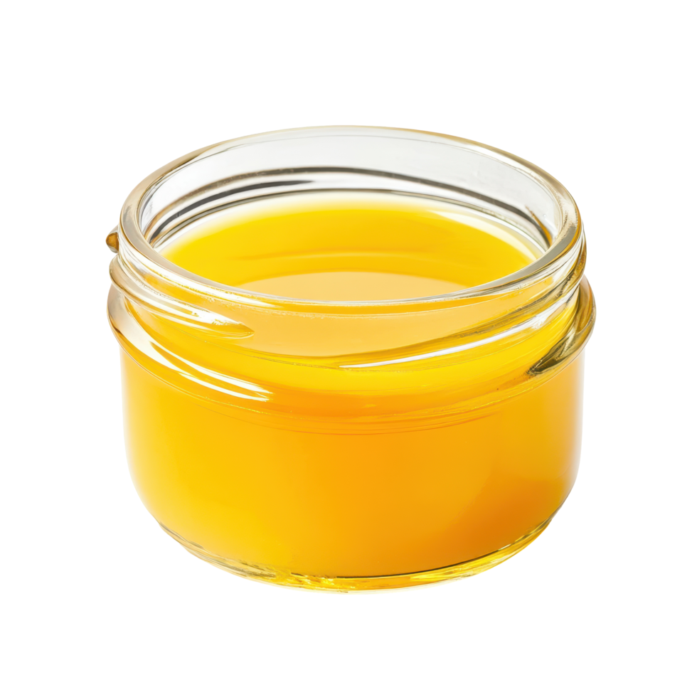 Bright yellow liquid in glass jar on white background highlighting its vibrant color and smooth texture png