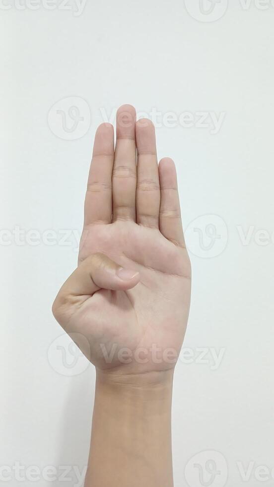 Closeup Asian female15-20 age hand show Number four finger, sign arm and hand isolated on a white background copy space symbol language photo