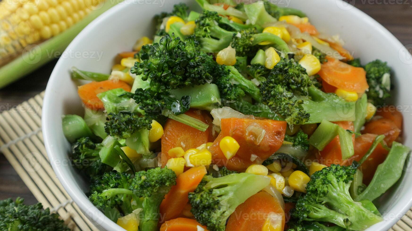Close up, Mix of vegetables on white bowl. Healthy asian food concept with copy space photo