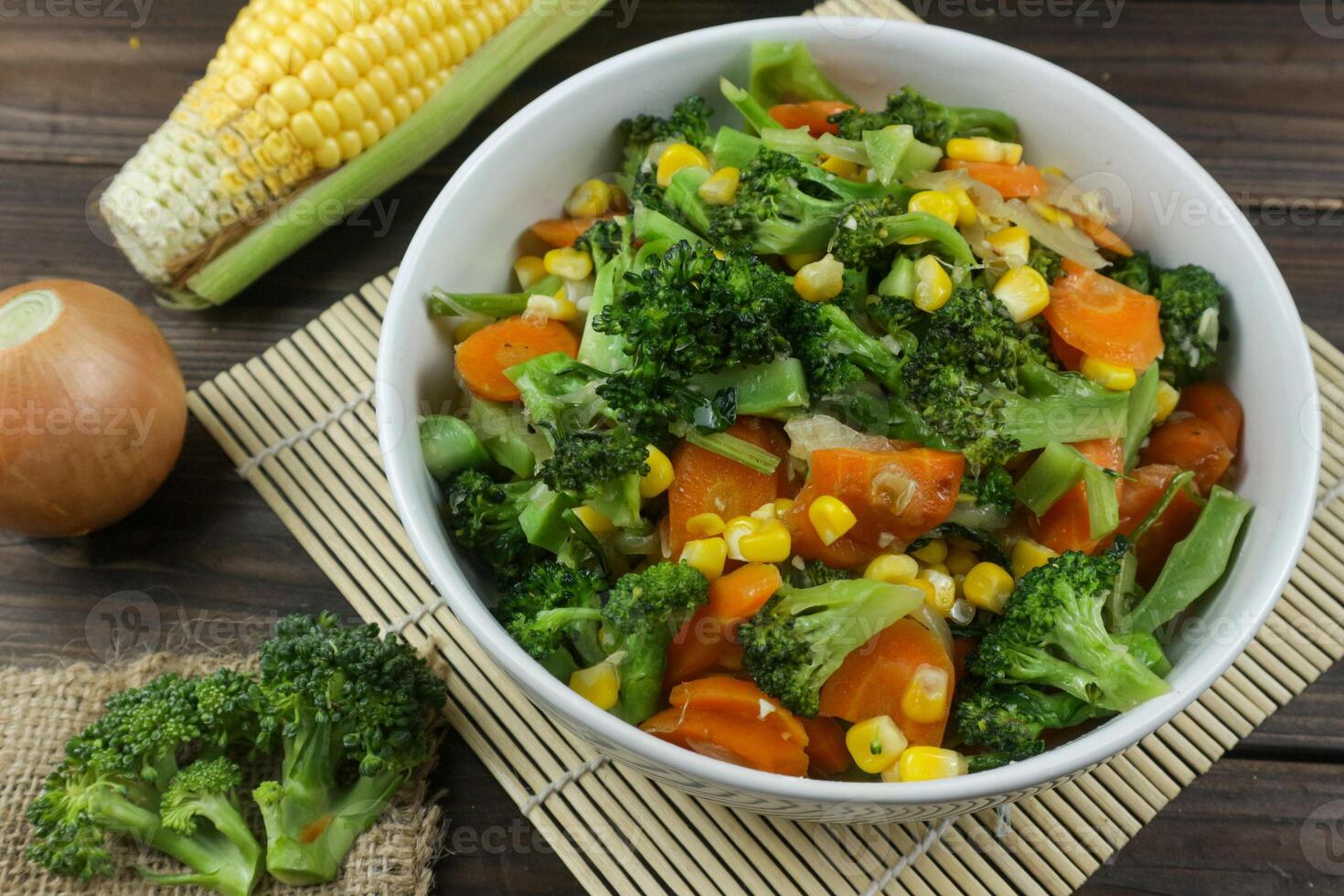 Mix of vegetables on white bowl. Healthy asian food concept photo