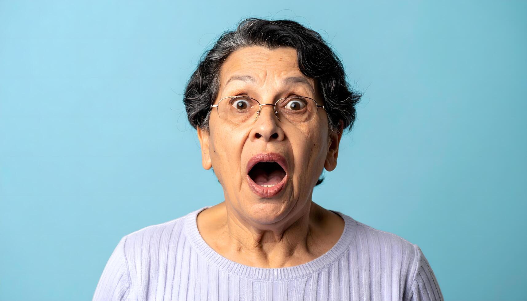 Shocked Elderly Woman with Mouth Open photo