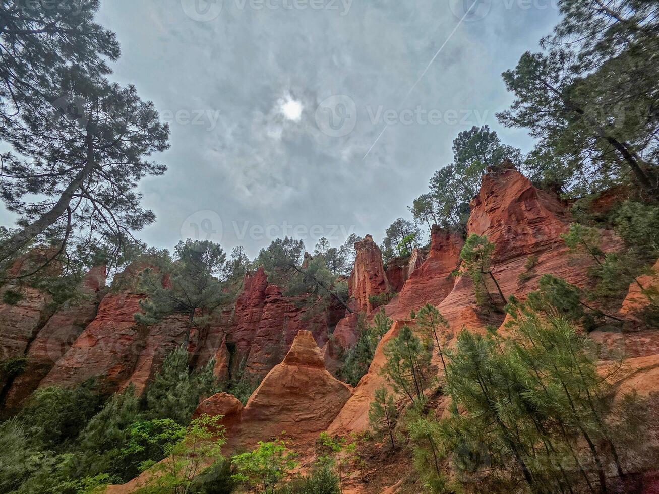 Colorado Ocher canyon valley massif in Provence france on cloudy day photo