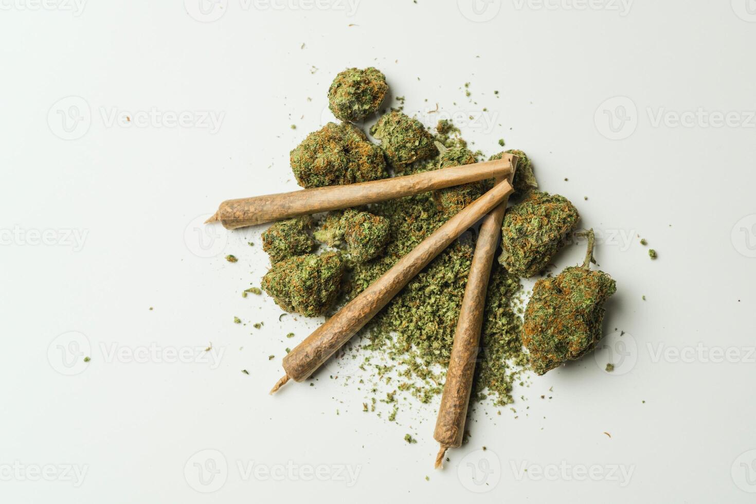 marijuana joint and buds on white background. photo