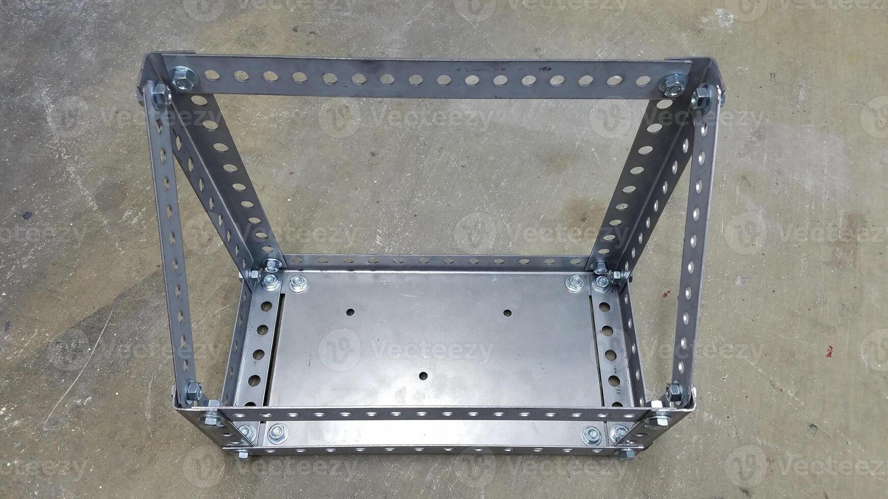 A Custom Metal Gas Can Holder for 4x4 Vehicle Made from Steel Perforated Angle photo