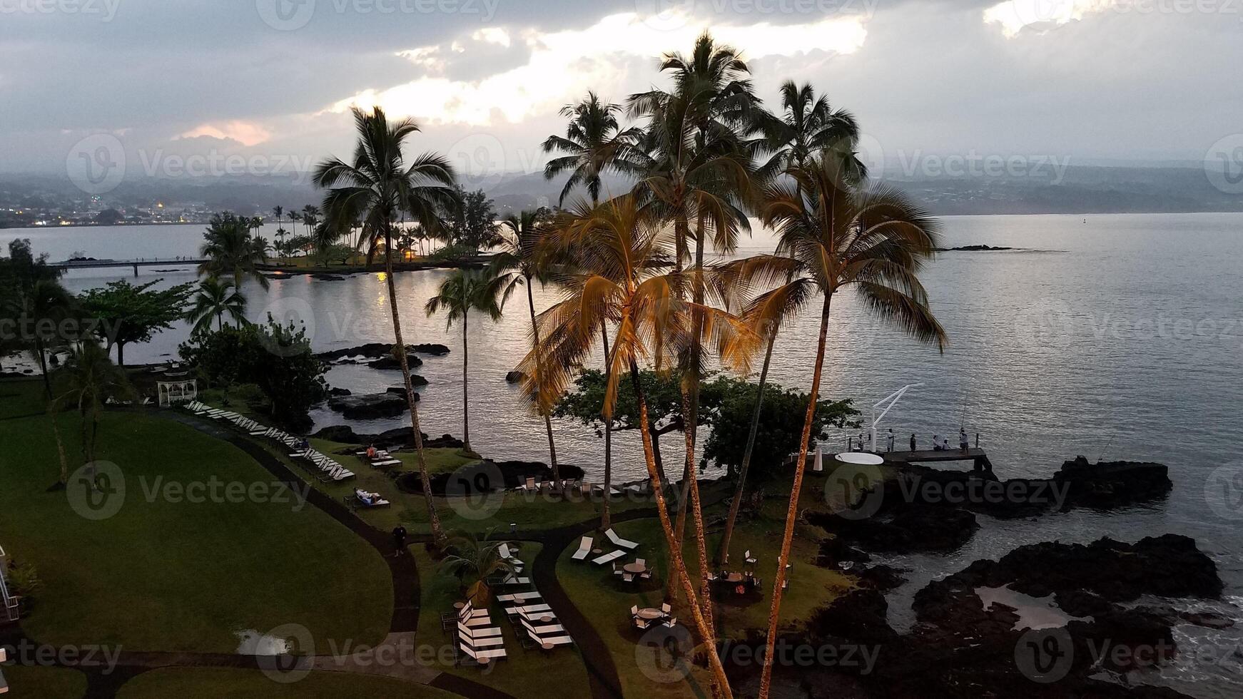View from Resort Window at Sunrise Looking Out at the Ocean, Hilo, Hawaii photo