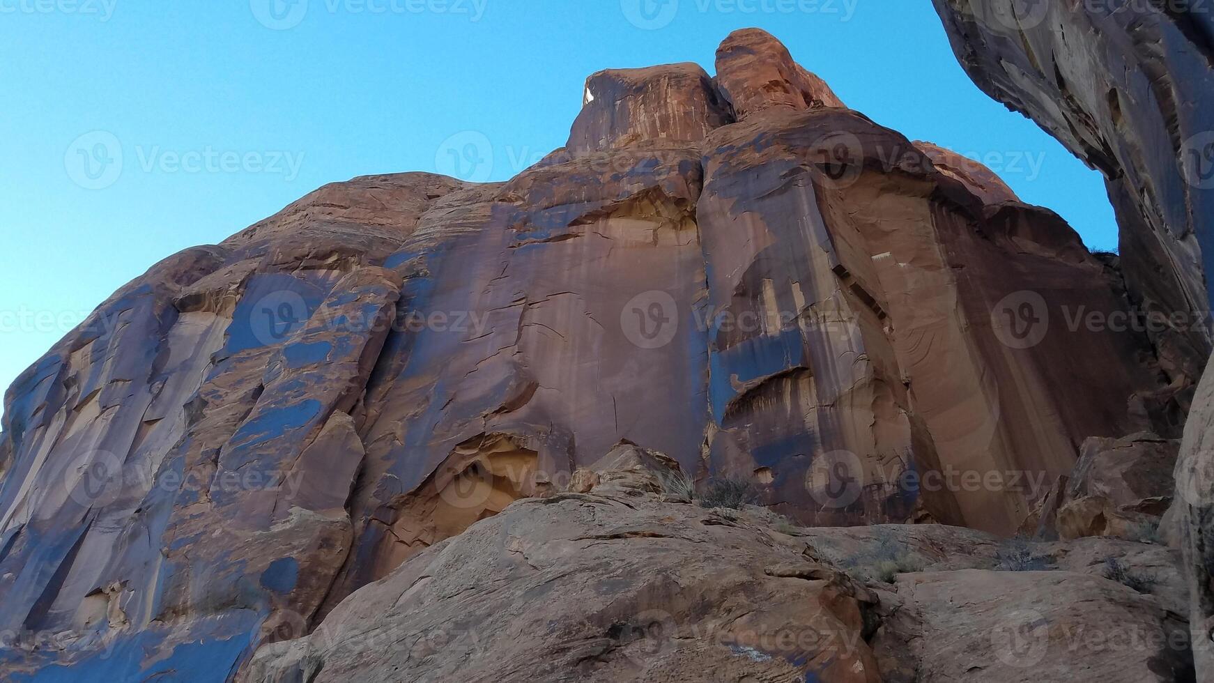 Roadside Petroglyphs Tall Cliff Face Near Moab, Utah photo
