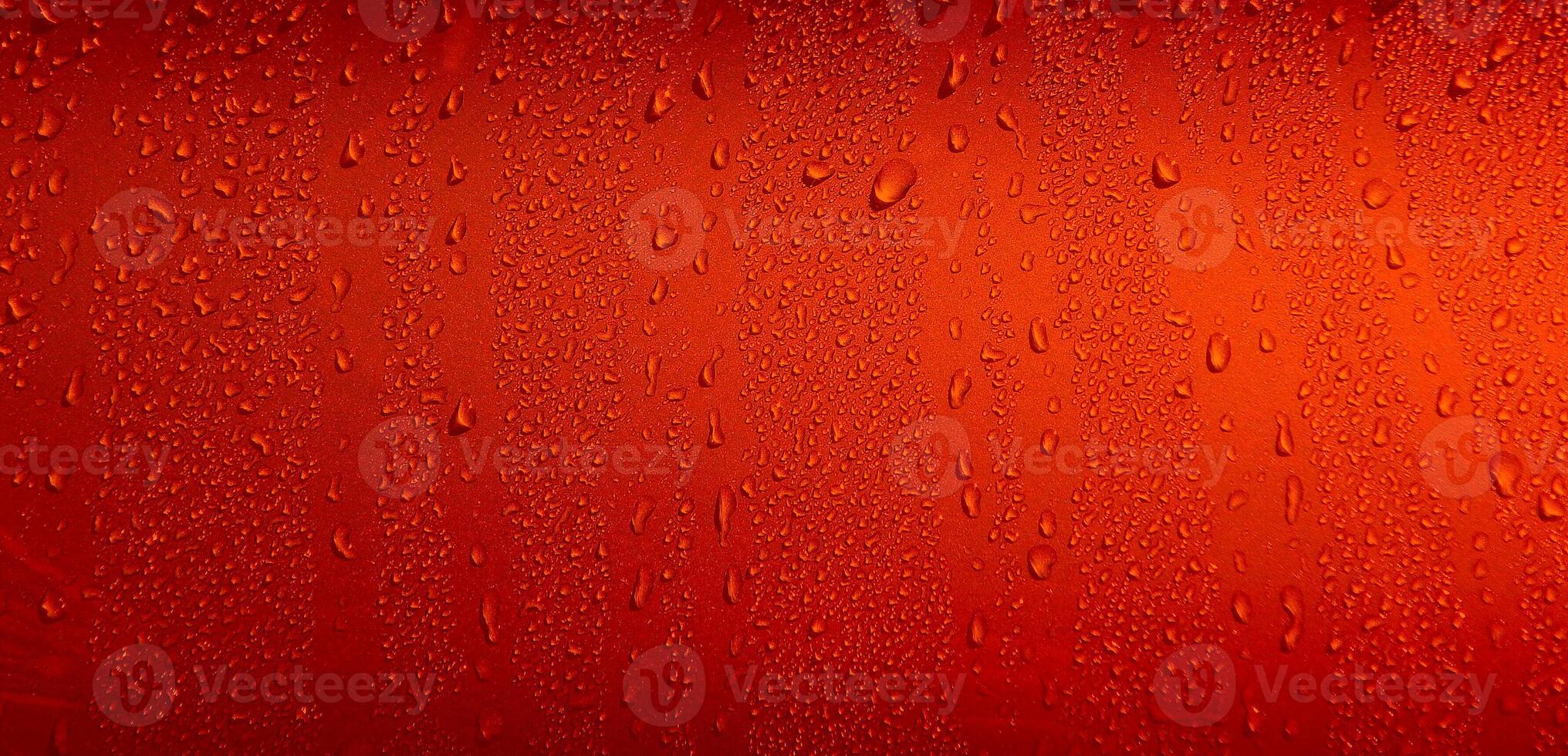 Red Water Drops Splashed On Flat Surface. Liquid drops on red Illustrative Stock Photo