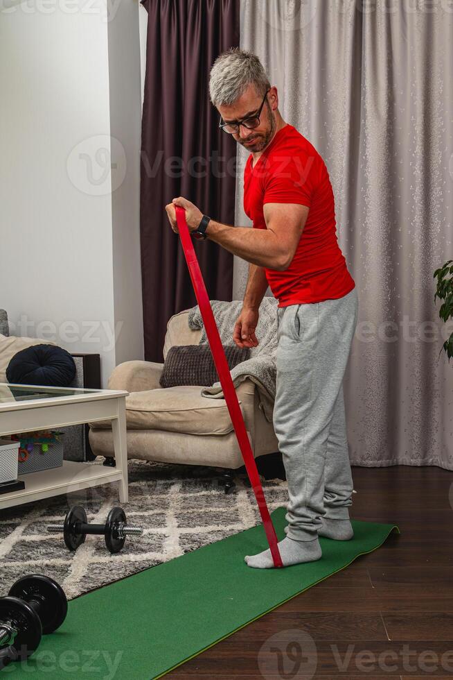 Fitness routine at home with resistance band training photo