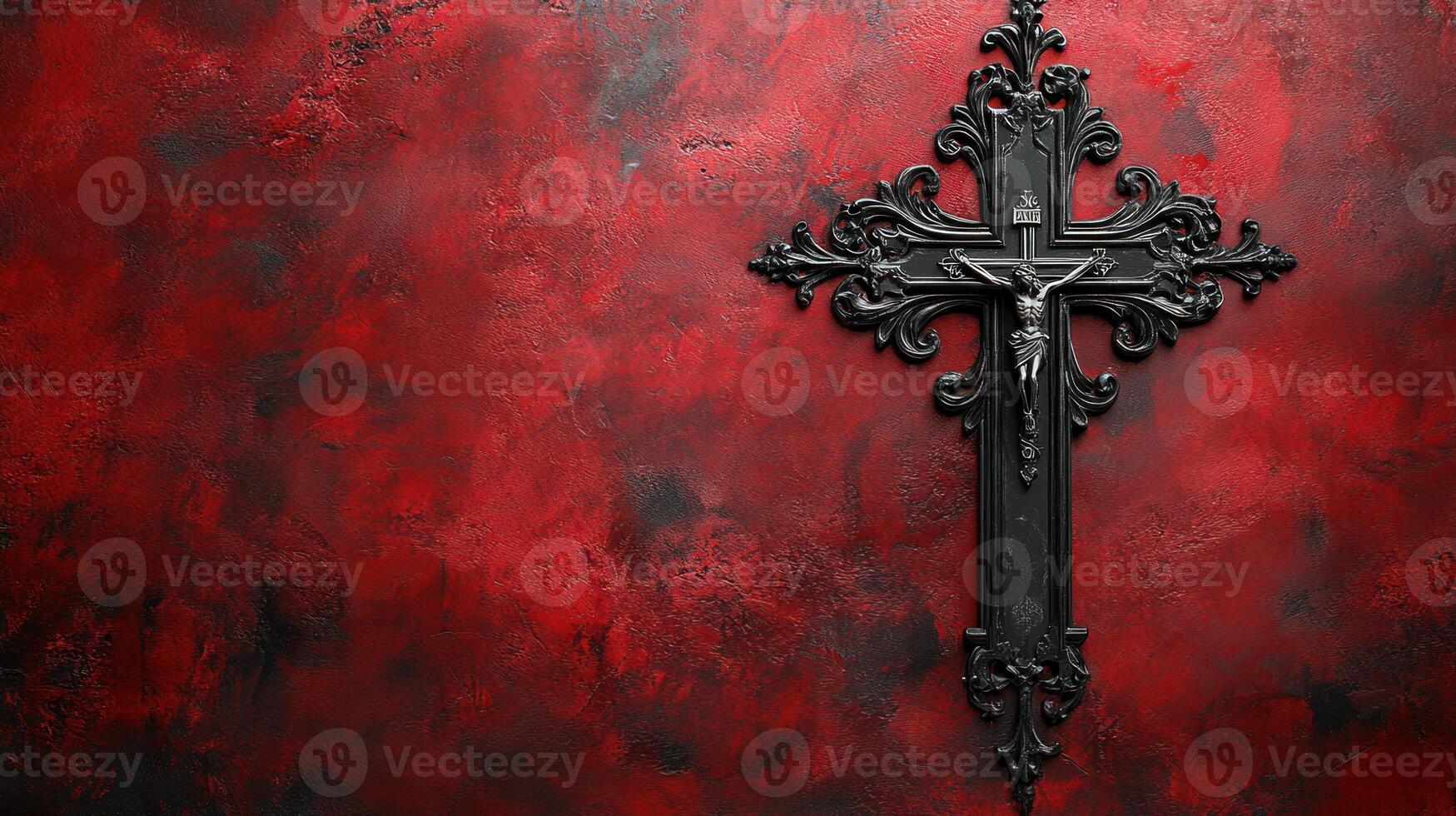 Dark ornate cross with figure of Christ hangs on textured red wall evoking dramatic world of faith and day of reflection with hint of dracula photo