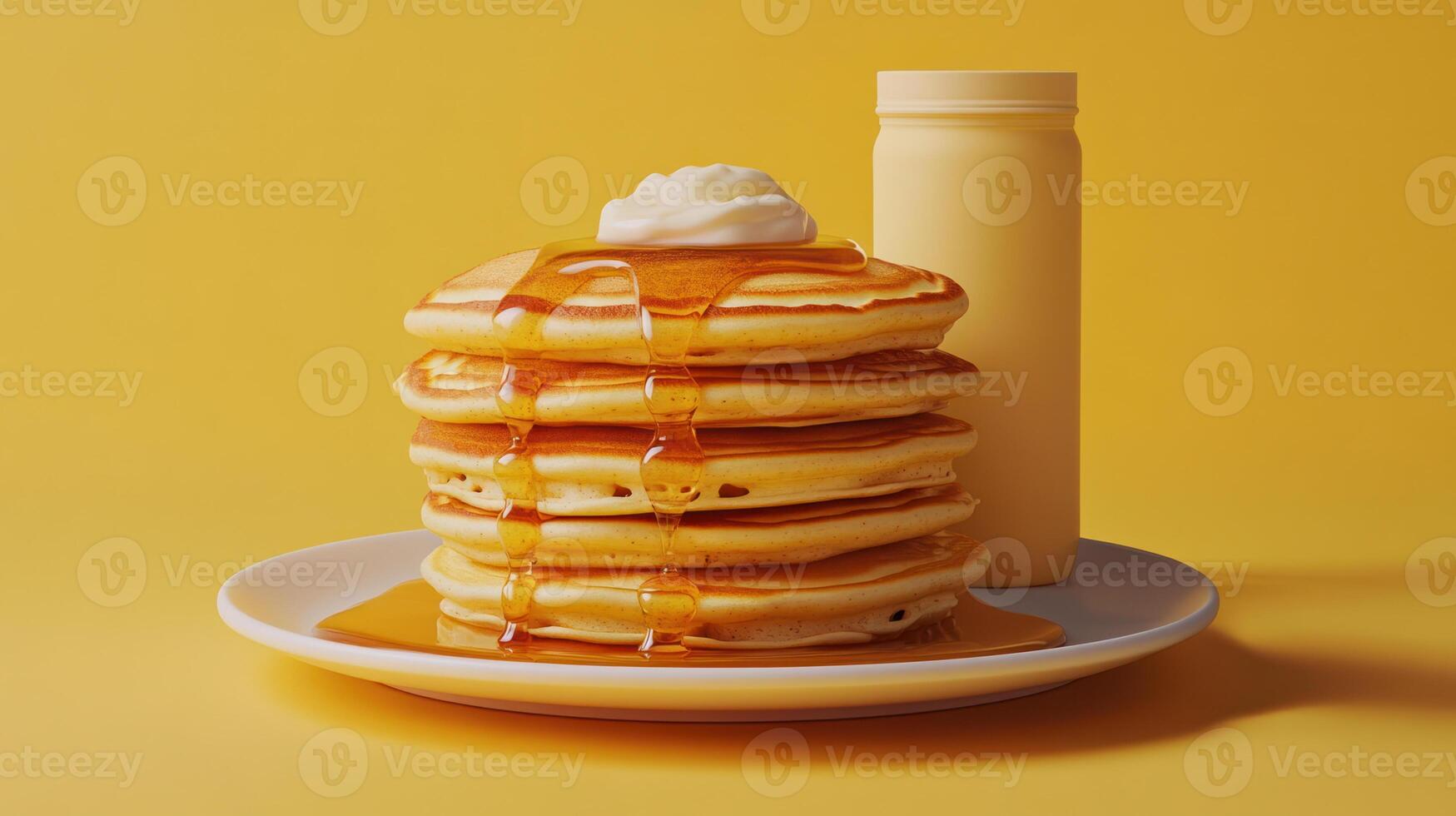 Stack of pancakes with syrup and cream on white plate next to bottle on yellow background, evoking warm breakfast mood photo
