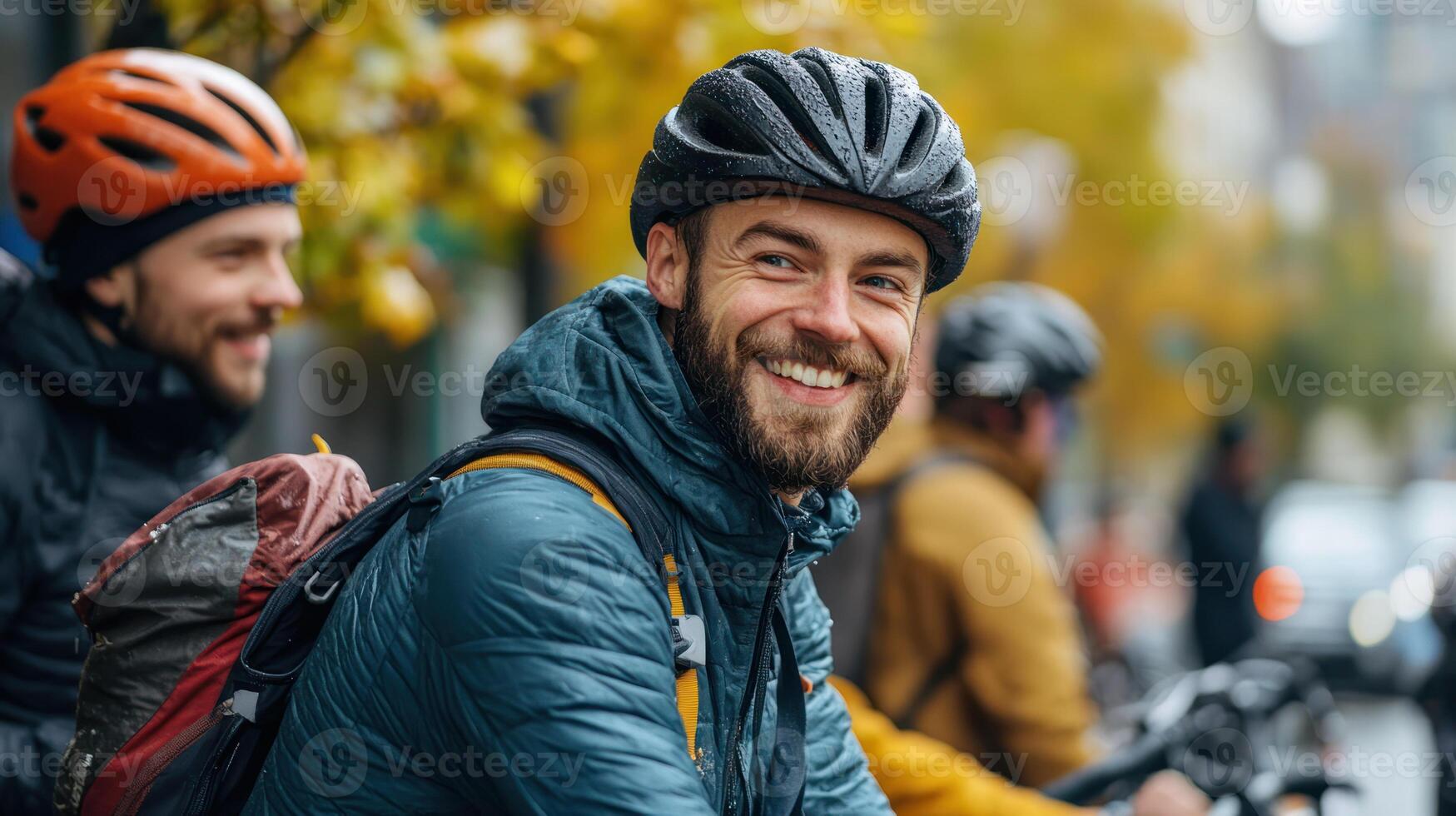 Cyclists smiling and chatting at city coffee stop before continuing their morning commute on bicycles with helmets and backpacks photo