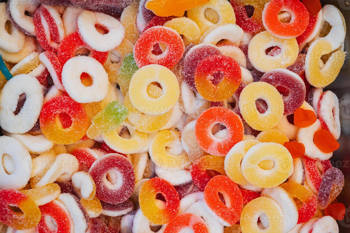 Assorted marmalade candies. Jelly candy background. View from above. photo