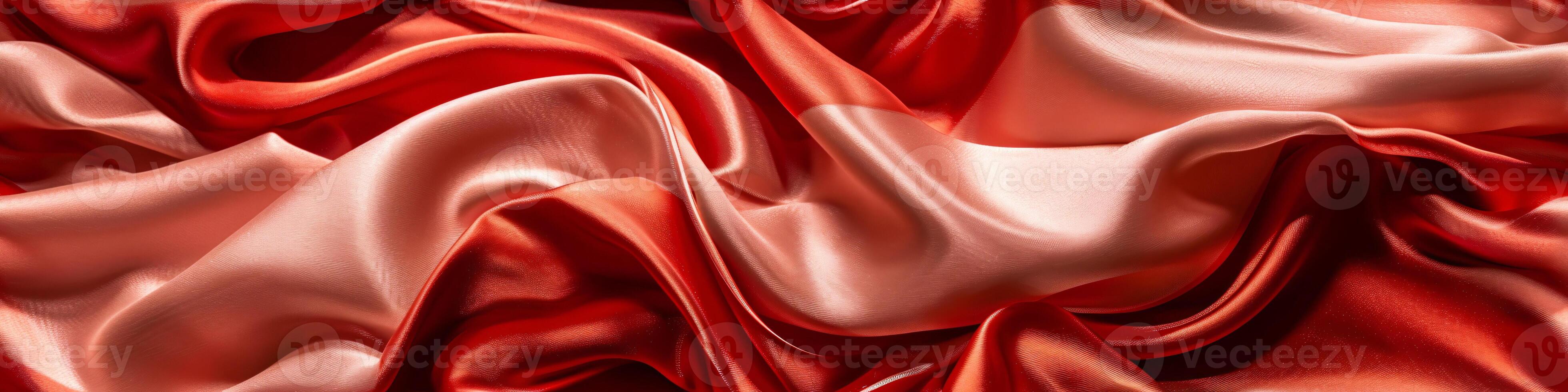 The banner texture of draped fabric of red color. Beautiful emerald soft silk textile. Design for texture, background, wallpaper. photo