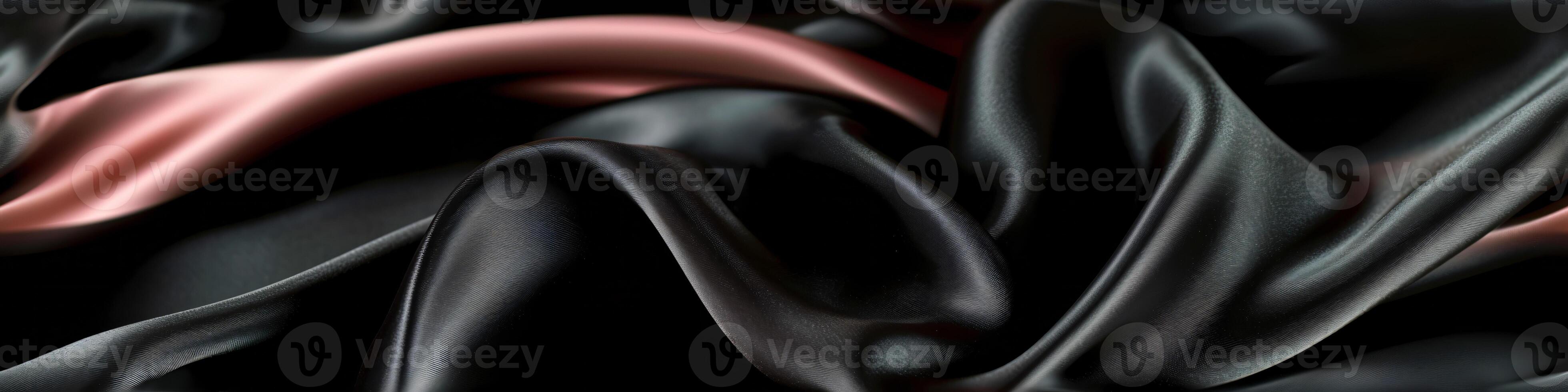 The banner texture of draped fabric of black and peach color. Beautiful emerald soft silk textile. Design for texture, background, wallpaper. photo