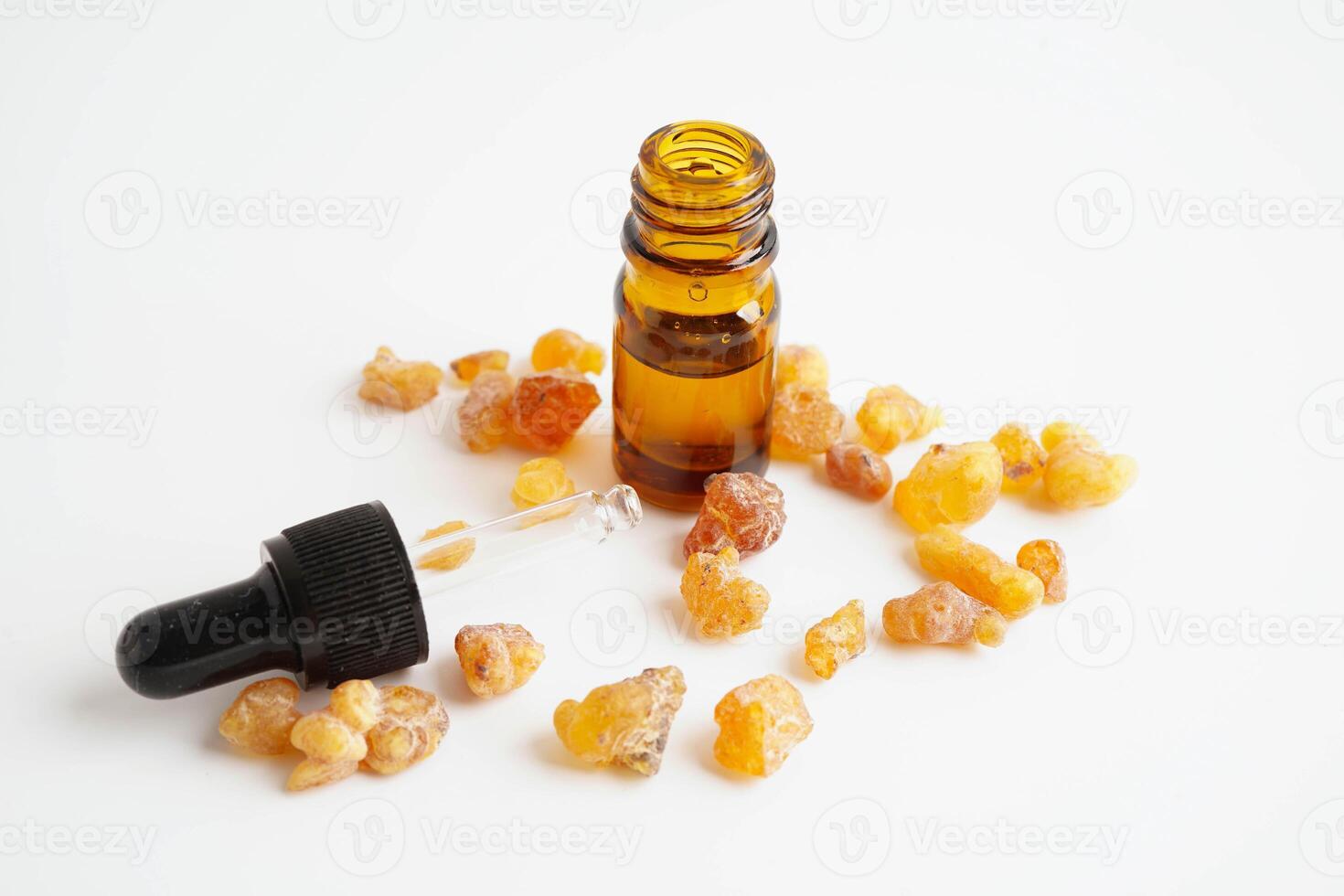 Frankincense or olibanum aromatic resin isolated on white background used in incense and perf photo