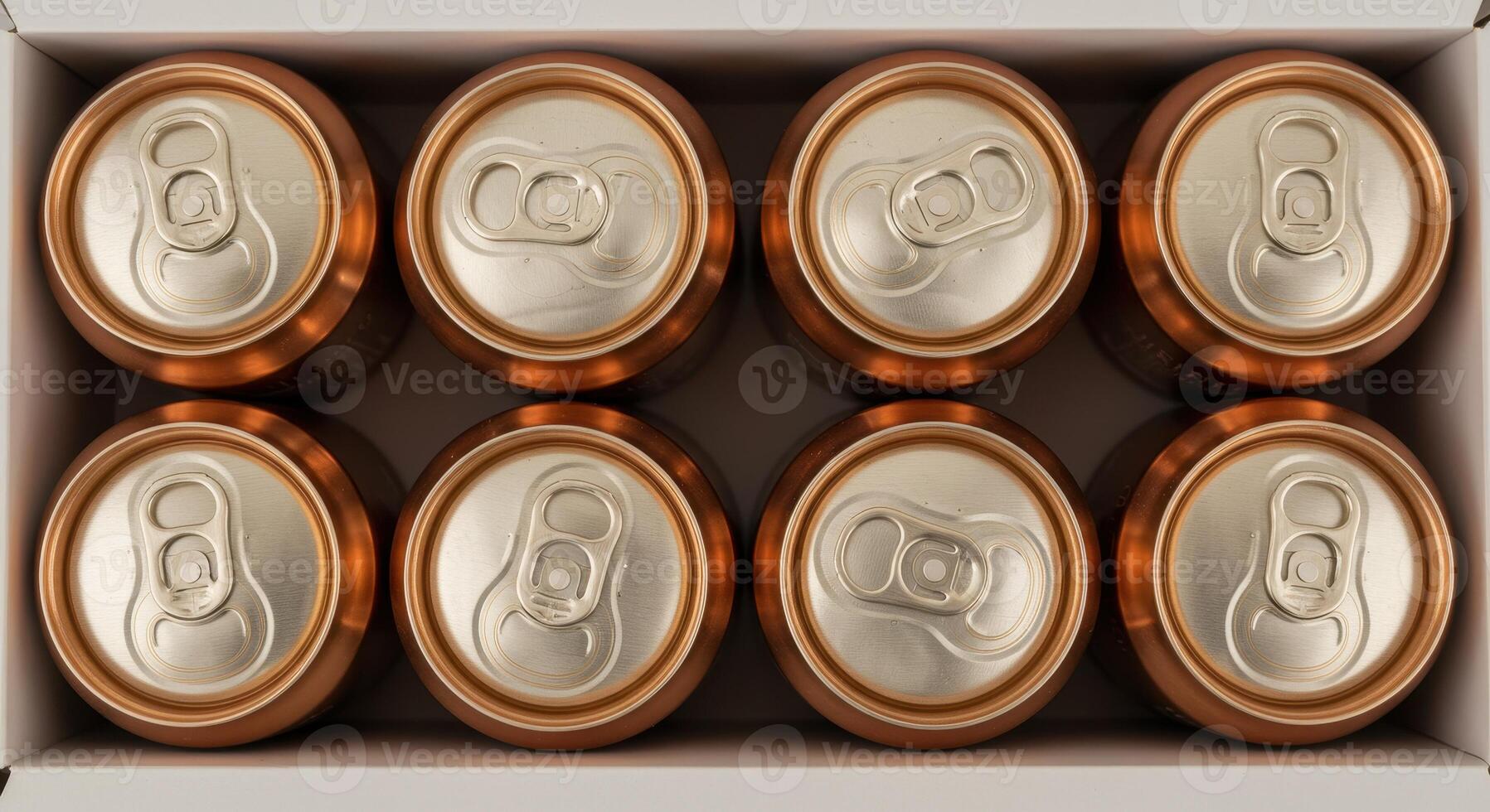 Eight bronze aluminum cans in a white cardboard box, shot from above. Beverage container, drink, recycle concept. photo