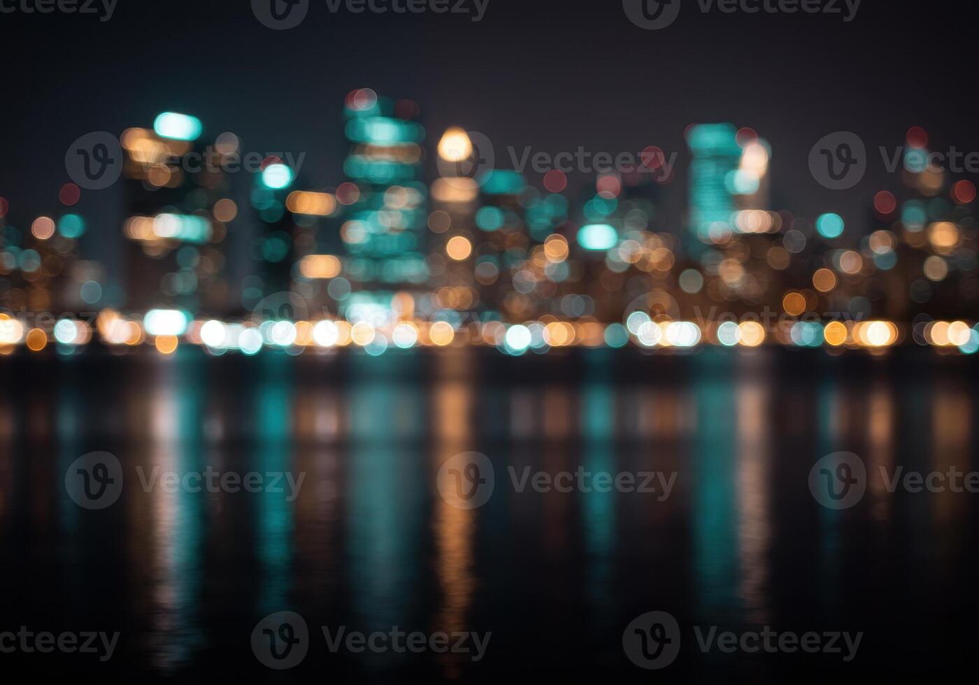 Defocused cityscape at night with blurred lights reflecting on water. Modern architecture with bokeh effect. Urban skyline with illuminated buildings. photo