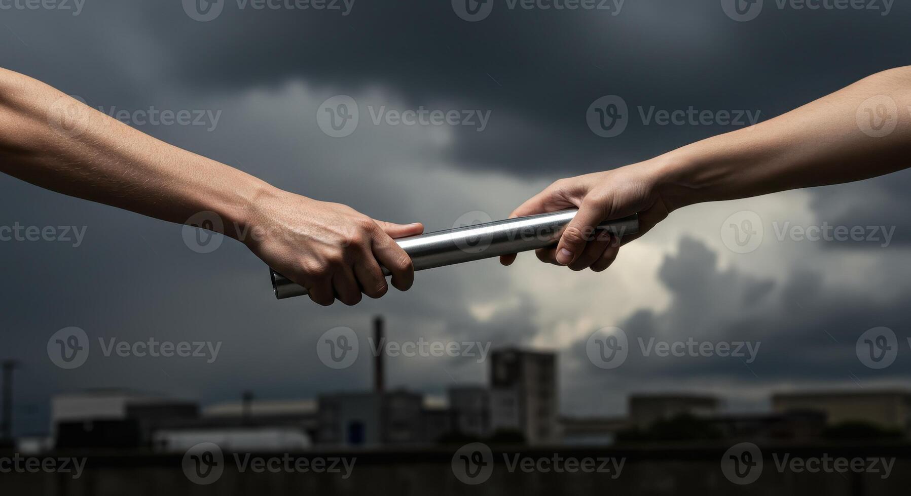 Two hands passing a silver relay baton against a dramatic cloudy sky and city buildings. Symbolizes teamwork, coordination, and the transition of responsibility. photo