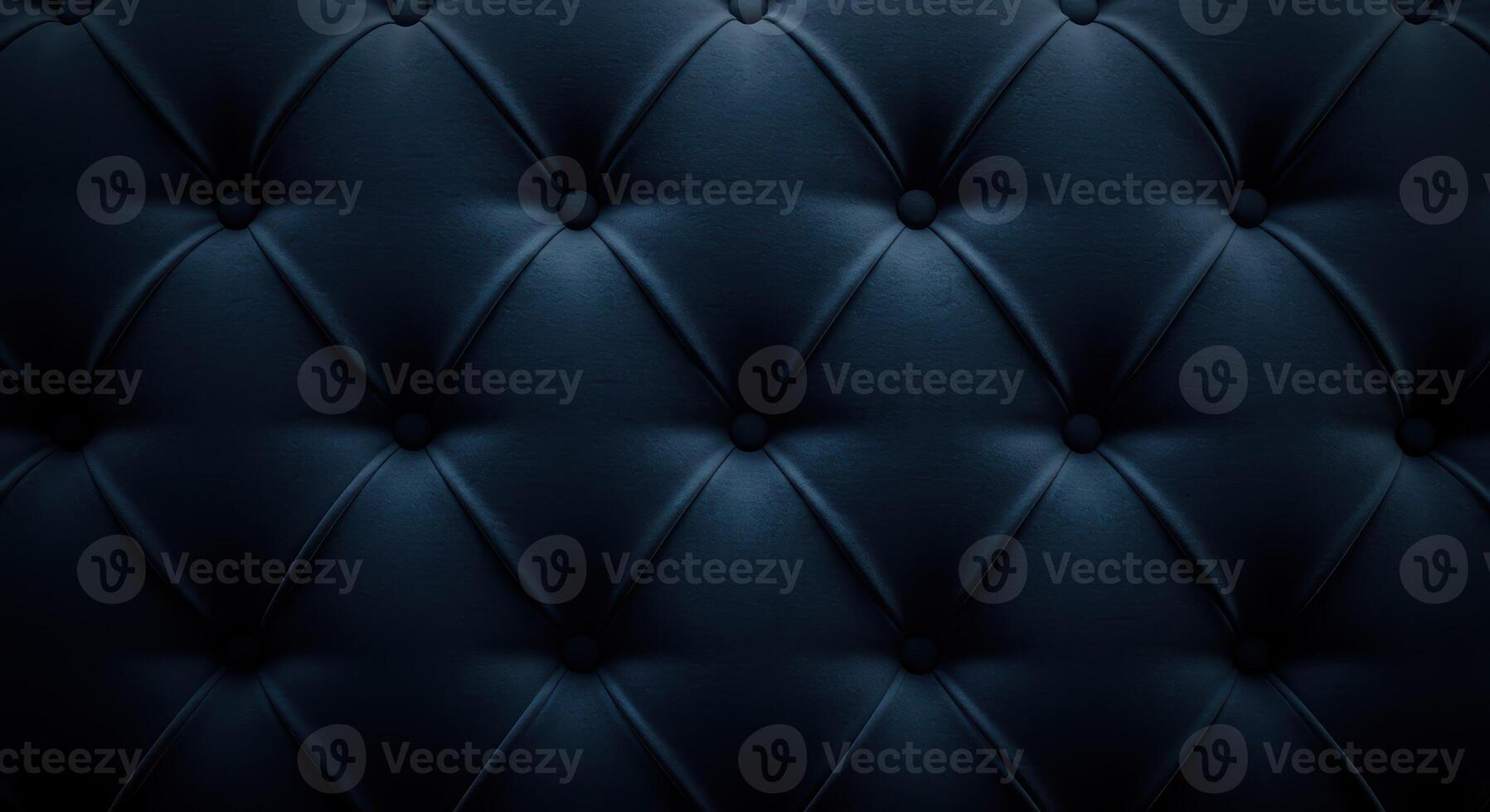 Close up of rich dark blue tufted velvet upholstery with an elegant diamond pattern, plush texture, and smooth matte finish for luxurious look. photo