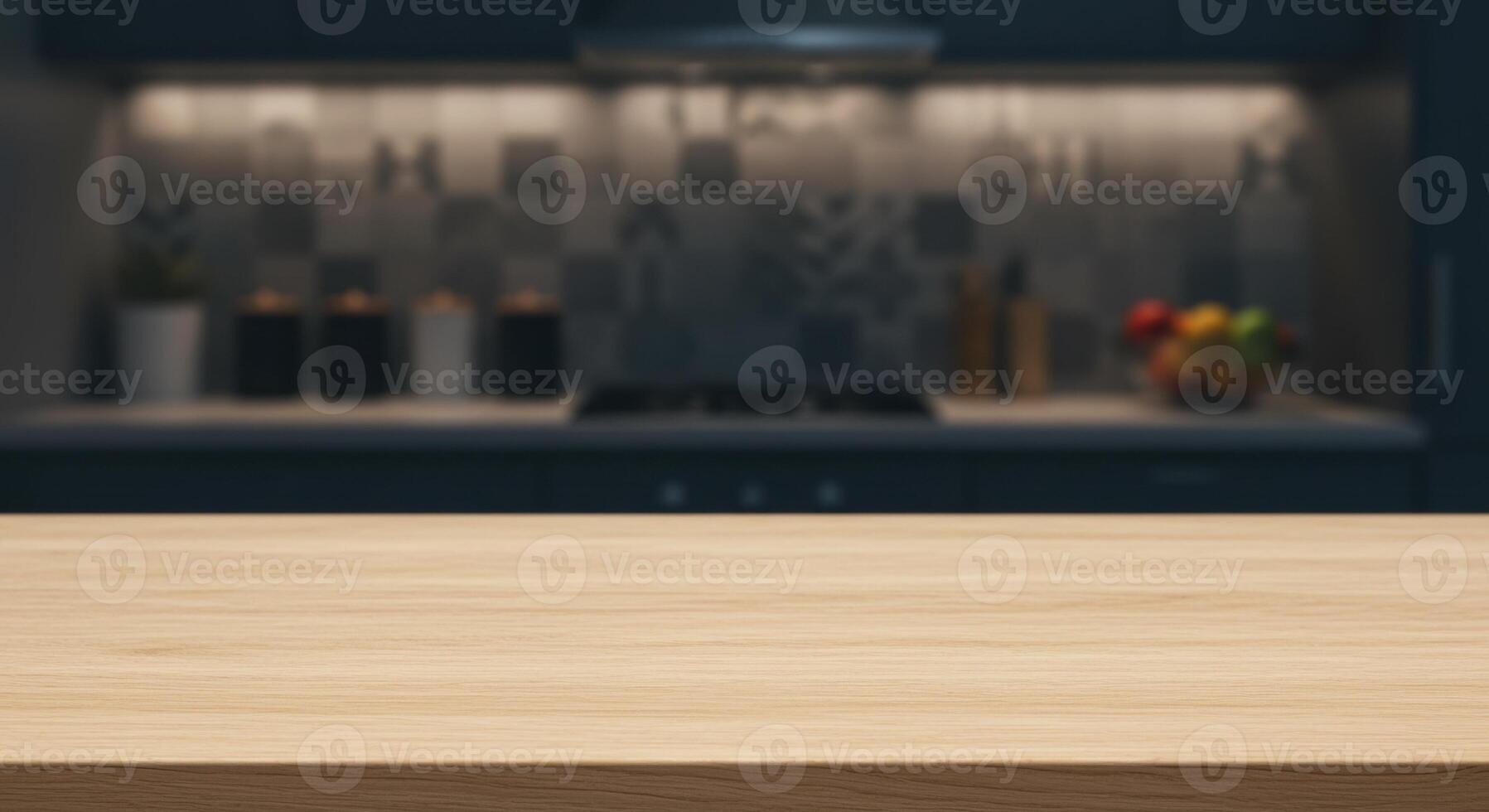 Clean, light colored wooden countertop with visible wood grain in a kitchen setting. Tile backsplash and blurred kitchenware in the background. photo