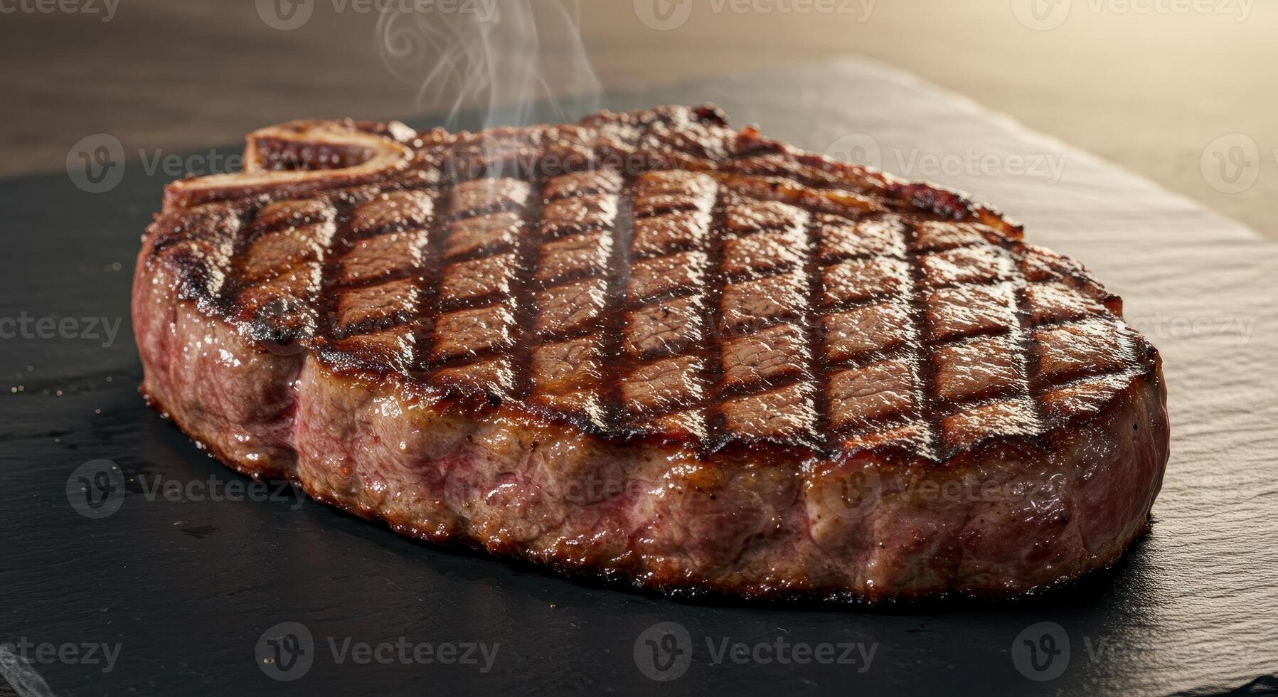 Delicious grilled ribeye steak with grill marks on a black stone plate, showcasing its juicy texture and savory appeal with smoke. photo