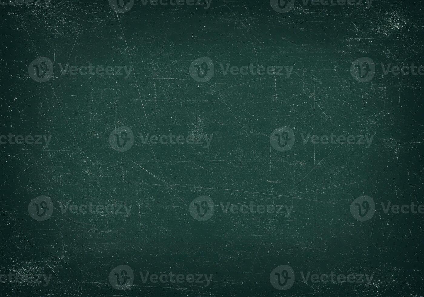 Dark green chalkboard with scratches. Texture of a school board with traces of chalk. Grunge surface for text, graphics, and design. Vintage style background. photo