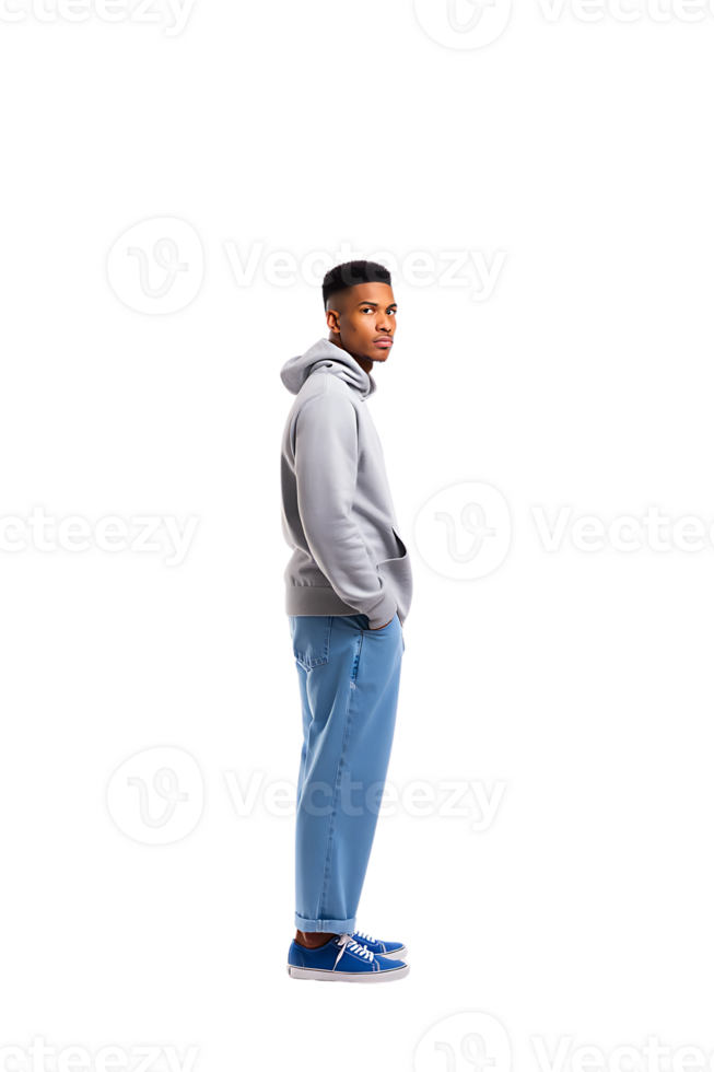 Stylish male model posing sideways wearing casual streetwear against a plain grey minimalist background png