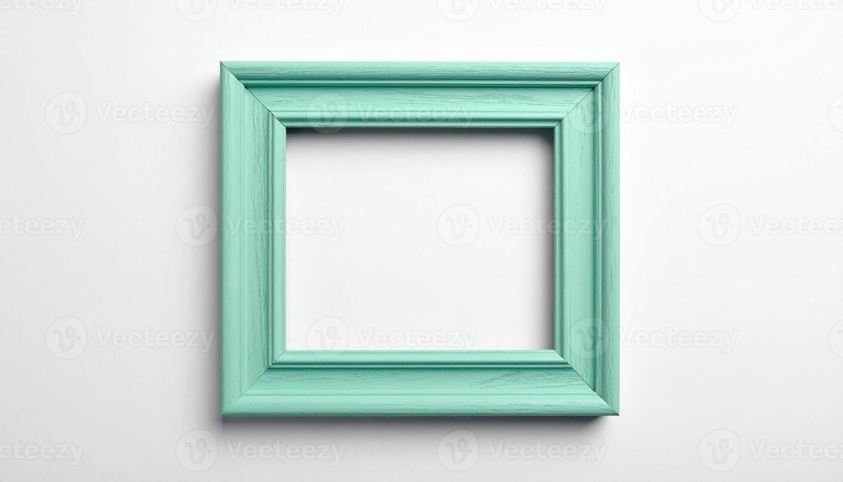 A green frame on a white wall photo