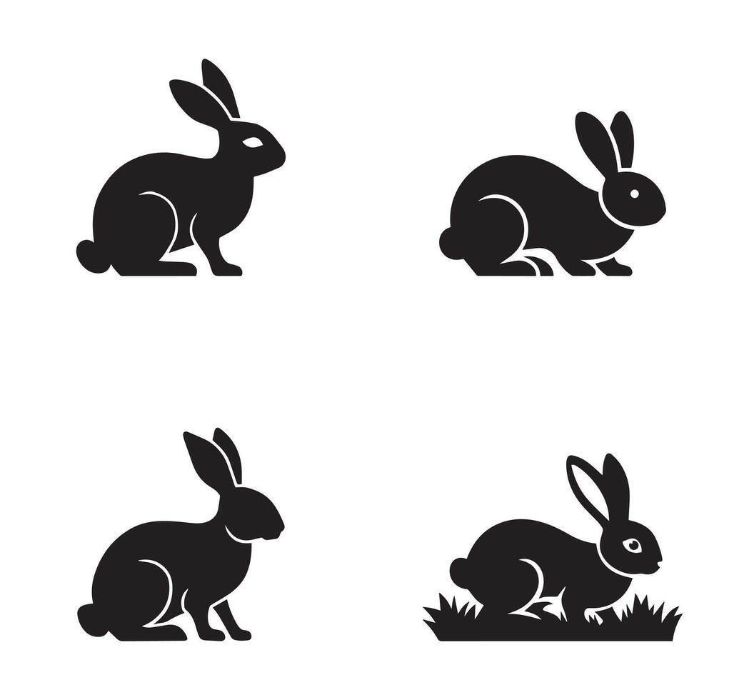 Collection of Four Simple Black Silhouettes of Rabbits in Different Poses vector