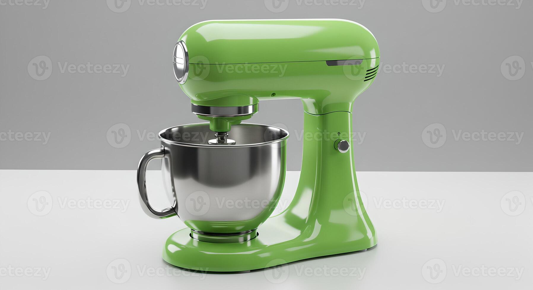 A green stand mixer with a metal bowl photo