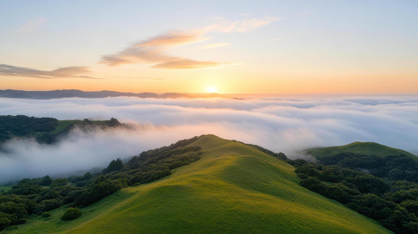 A beautiful sunrise over the hills and valleys photo
